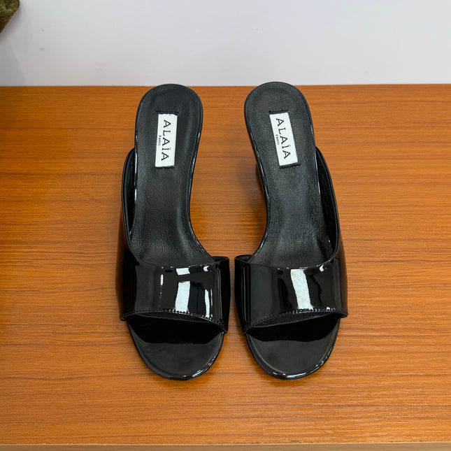 ALAIA WEDGE SANDALS 25S IN BLACK LAMBSKIN