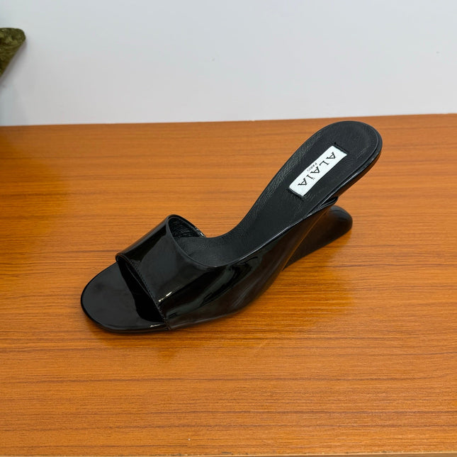 ALAIA WEDGE SANDALS 25S IN BLACK LAMBSKIN