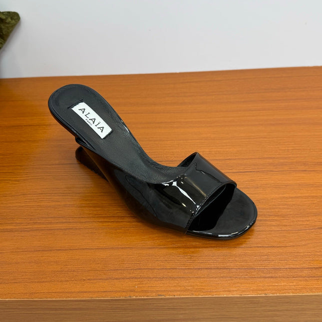 ALAIA WEDGE SANDALS 25S IN BLACK LAMBSKIN