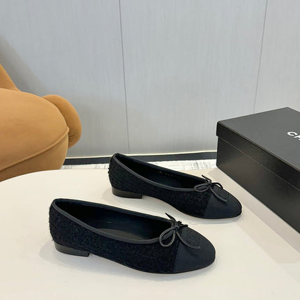 BALLET FLATS IN BLACK TWEED AND FABRIC