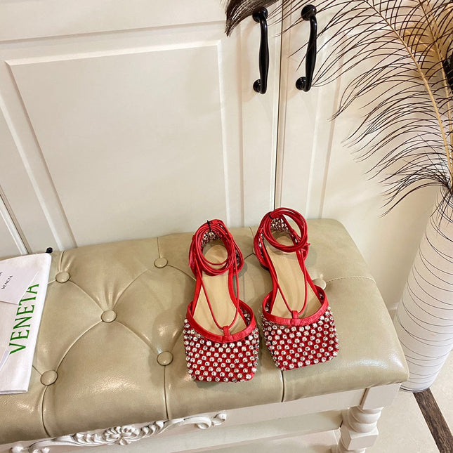 LACE-UP FLAT SANDAL IN RUBY RED METALLIZED MESH AND LEATHER WITH RHINSTONES