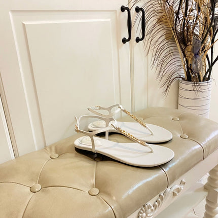 GG SIGNORINA THONG SANDALS IN WHITE SHEEPSKIN