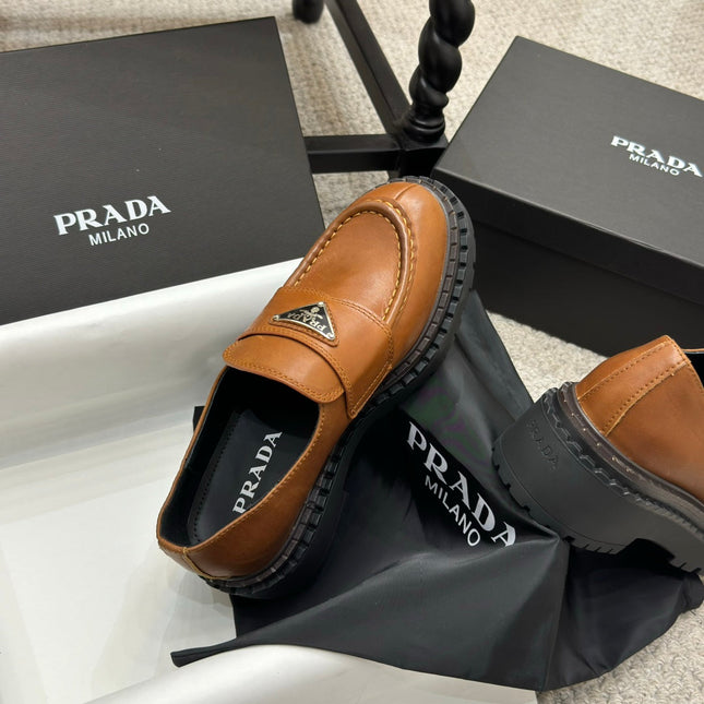 PRADA 25S LOAFER 50MM IN BURNT ORANGE CALFSKIN LOGO