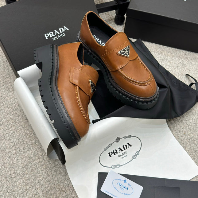 PRADA 25S LOAFER 50MM IN BURNT ORANGE CALFSKIN LOGO