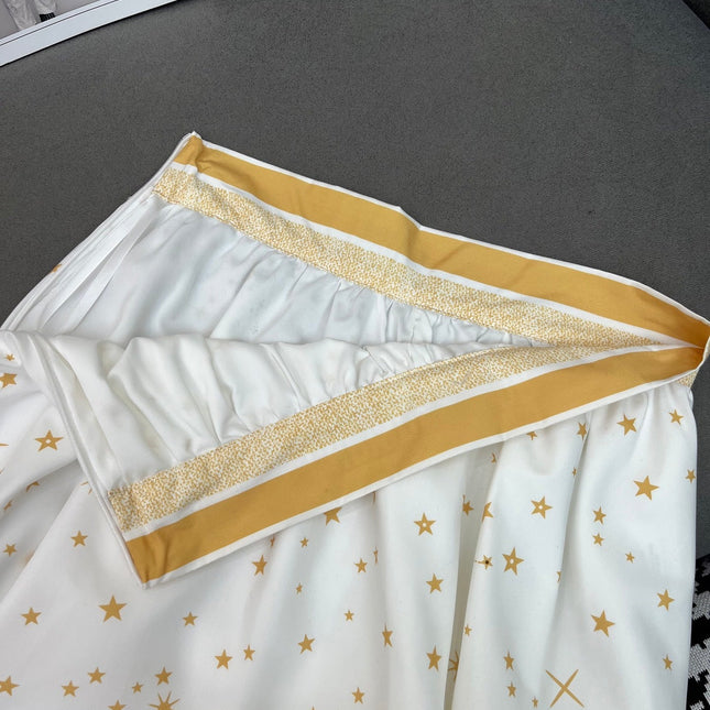 WHITE FLARED SKIRT WITH PRINT