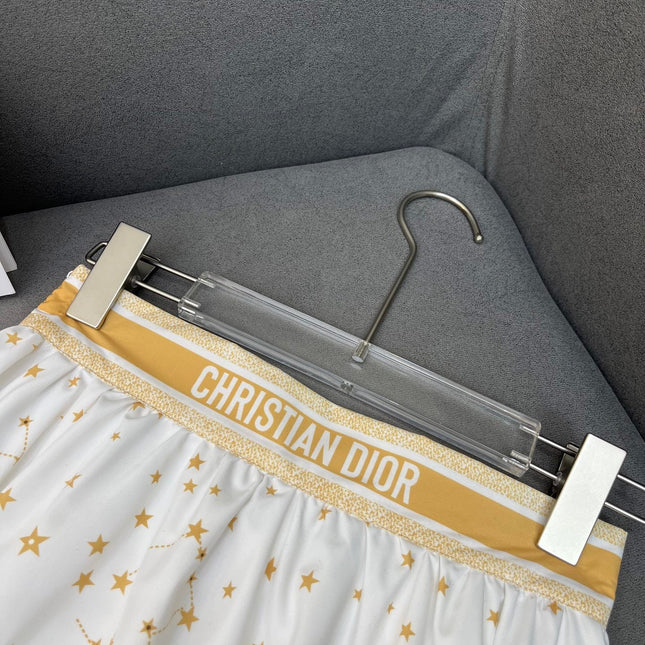 WHITE FLARED SKIRT WITH PRINT