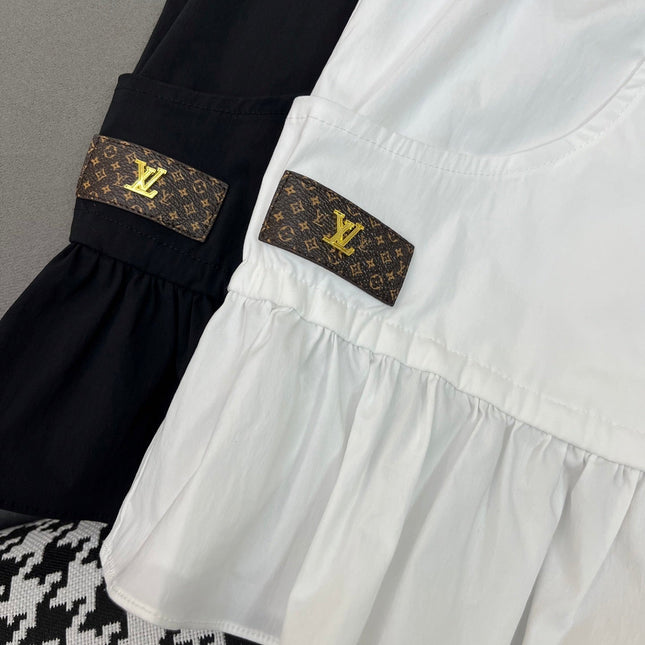 HIGH-NECK SLEEVELESS TOP WITH ZIP CLOSURE