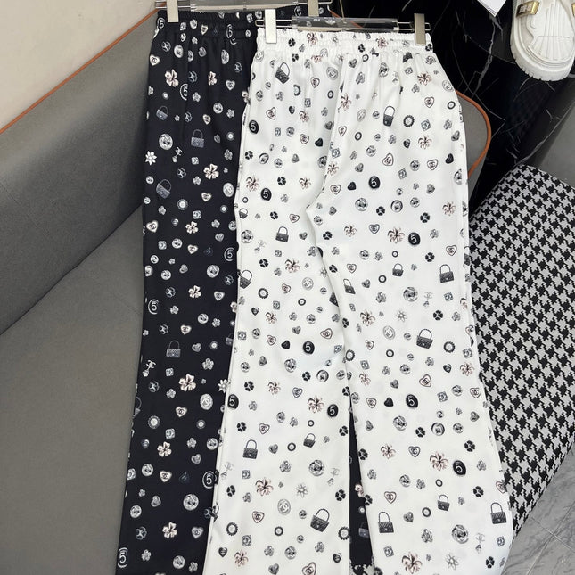 ALL-OVER LOGO PRINTED PANTS WITH STRETCH WAIST