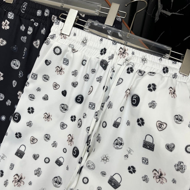 ALL-OVER LOGO PRINTED PANTS WITH STRETCH WAIST