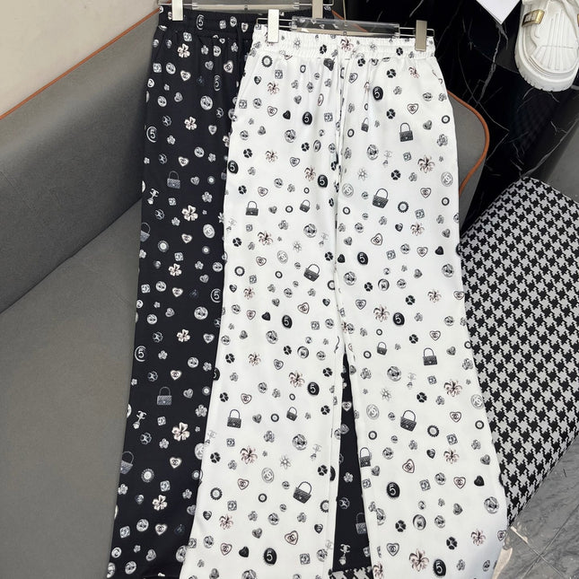 ALL-OVER LOGO PRINTED PANTS WITH STRETCH WAIST