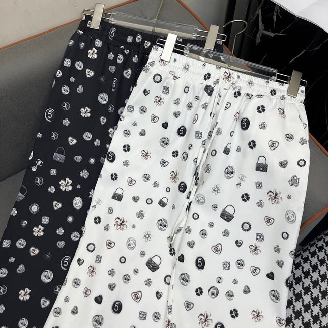 ALL-OVER LOGO PRINTED PANTS WITH STRETCH WAIST