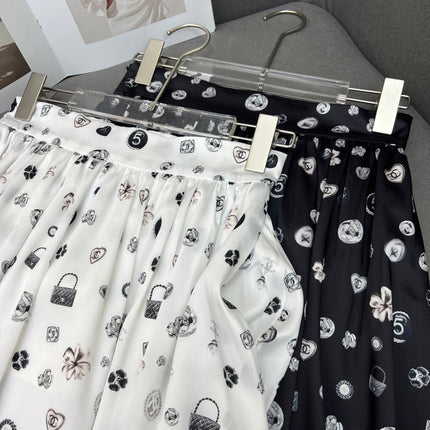 FLARED SKIRT WITH SIGNATURE BRAND PRINT