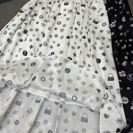 FLARED SKIRT WITH SIGNATURE BRAND PRINT