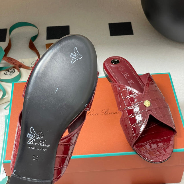 FLAT SLIPPERS IN RED CALFSKIN SNAKE EMBOSSING