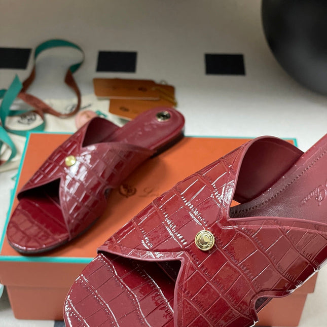 FLAT SLIPPERS IN RED CALFSKIN SNAKE EMBOSSING