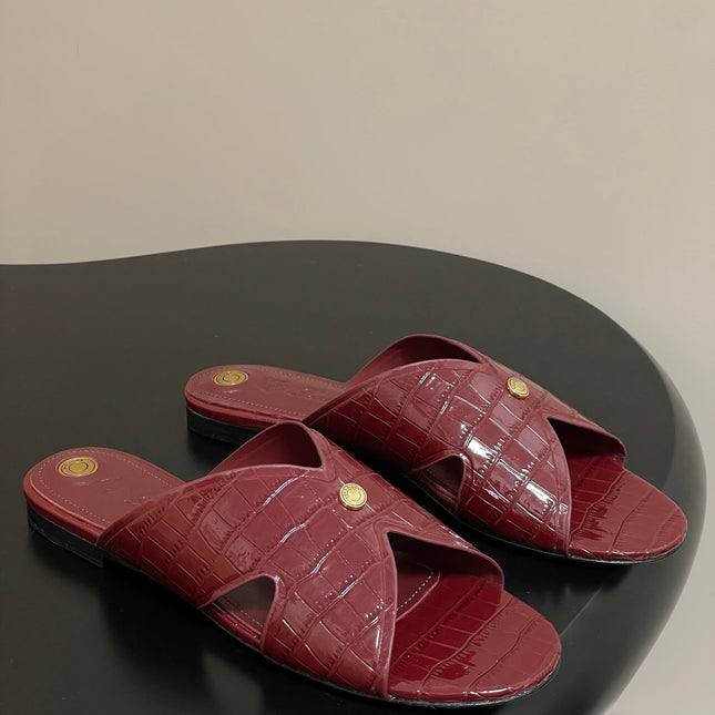 FLAT SLIPPERS IN RED CALFSKIN SNAKE EMBOSSING