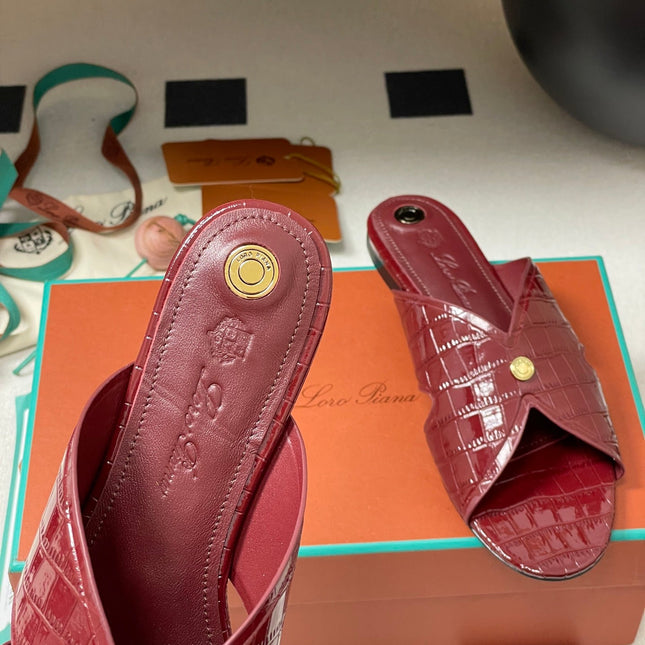 FLAT SLIPPERS IN RED CALFSKIN SNAKE EMBOSSING