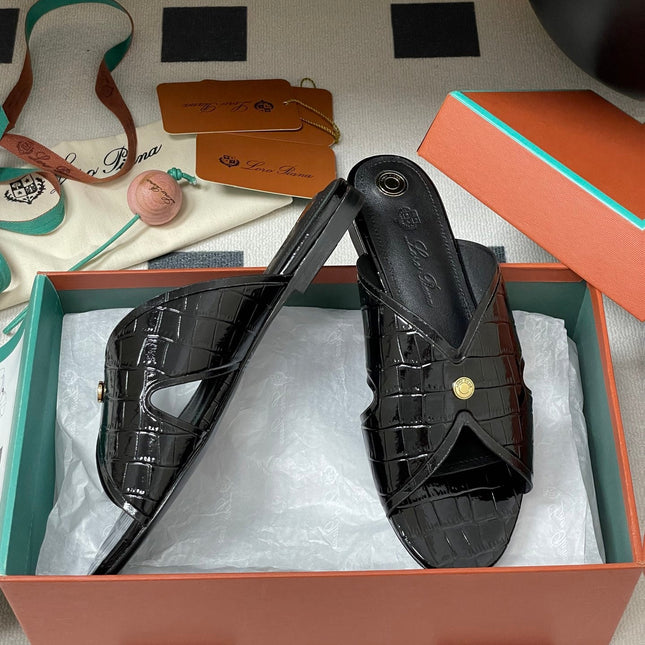 FLAT SLIPPERS IN BLACK CALFSKIN SNAKE EMBOSSING