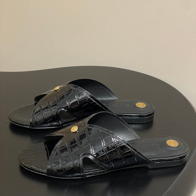 FLAT SLIPPERS IN BLACK CALFSKIN SNAKE EMBOSSING