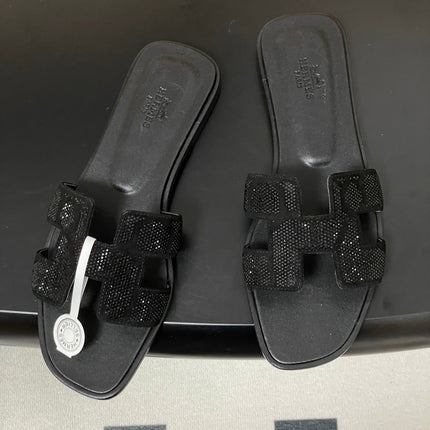 HM 25S ORAN SANDAL IN BLACK LAMBSKIN WITH STONE DETAILS