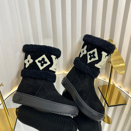 SNOWDROP FLAT ANKLE BOOTS IN BLACK SUEDE