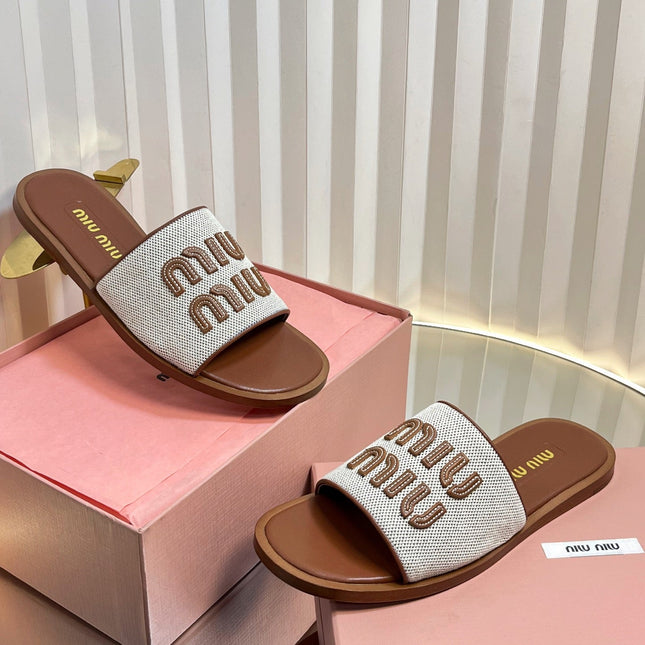 SLIDES SANDALS IN BROWN STRAW WOVEN