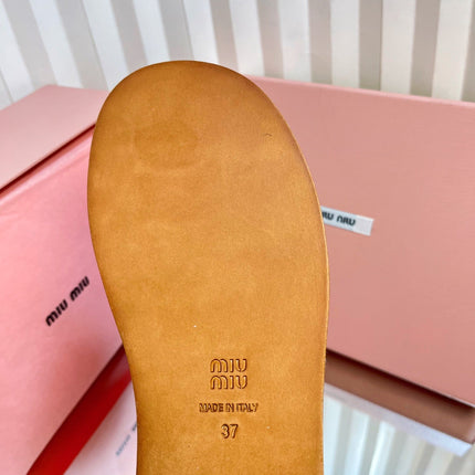 SLIDES SANDALS IN BROWN STRAW WOVEN