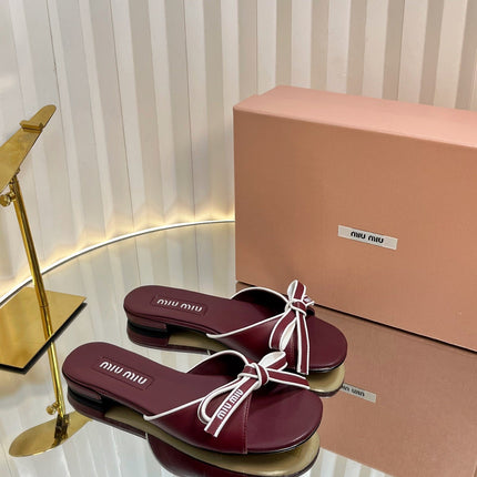 SLIDES SANDALS IN BURGUNDY RED CALFSKIN BOW IN TRAP