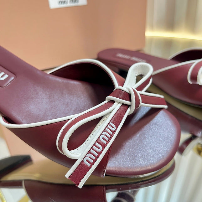 SLIDES SANDALS IN BURGUNDY RED CALFSKIN BOW IN TRAP