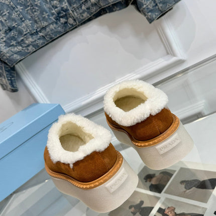 TRIANGLE LOGO MULES IN BRONZE BROWN SUEDE AND SHEARLING LINING