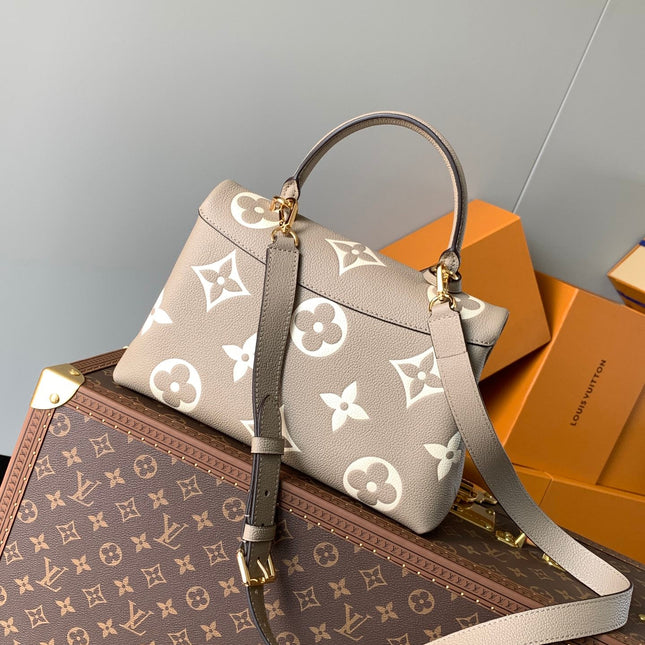 MADELEINE 30 IN BEIGE MONOGRAM CALFSKIN EMBOSSED LOGO