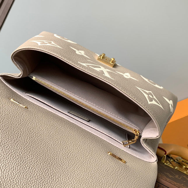 MADELEINE 30 IN BEIGE MONOGRAM CALFSKIN EMBOSSED LOGO