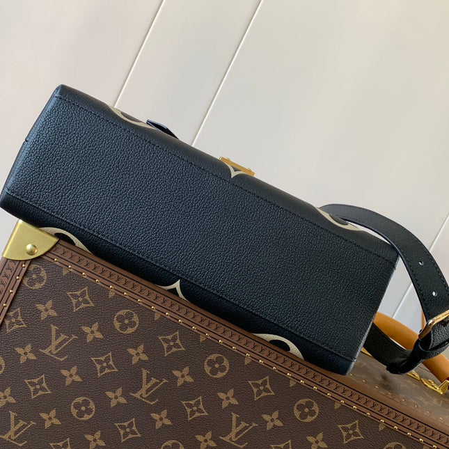 MADELEINE 30 IN BLACK MIX WHITE MONOGRAM CALFSKIN EMBOSSED LOGO