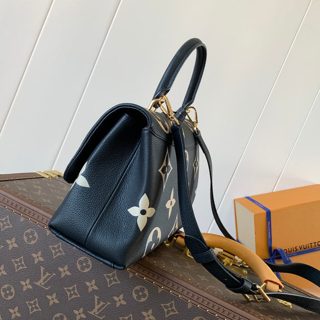 MADELEINE 30 IN BLACK MIX WHITE MONOGRAM CALFSKIN EMBOSSED LOGO