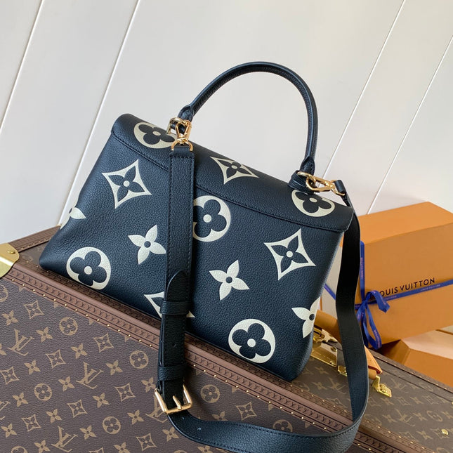 MADELEINE 30 IN BLACK MIX WHITE MONOGRAM CALFSKIN EMBOSSED LOGO