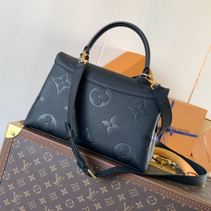 MADELEINE 30 IN BLACK MONOGRAM CALFSKIN EMBOSSED LOGO