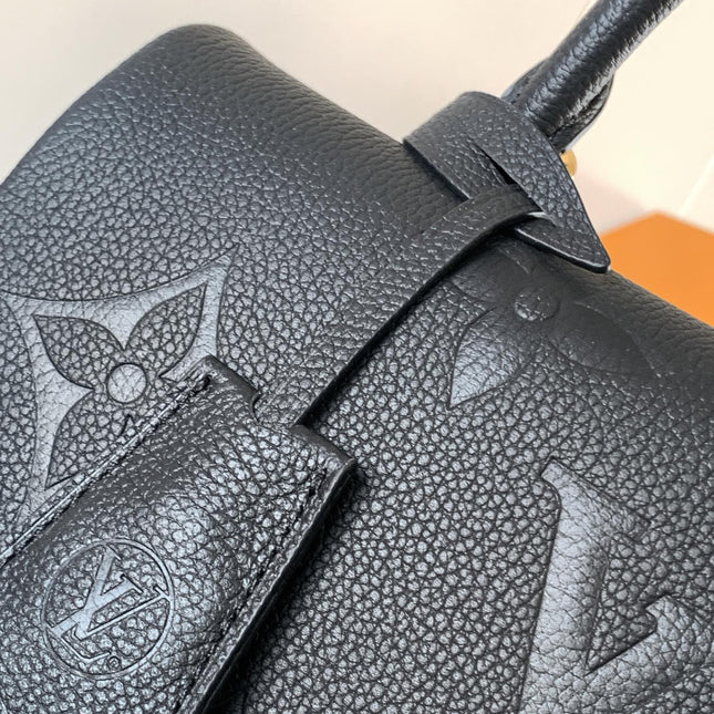 MADELEINE 30 IN BLACK MONOGRAM CALFSKIN EMBOSSED LOGO