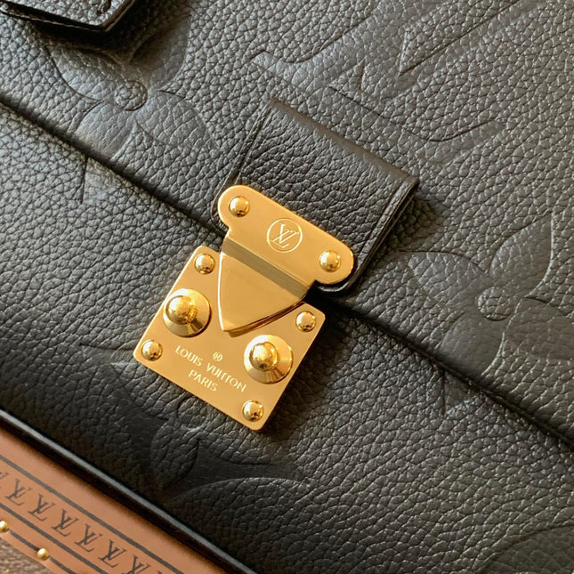 MADELEINE 30 IN BLACK MONOGRAM CALFSKIN EMBOSSED LOGO