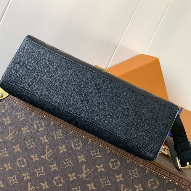 MADELEINE 30 IN BLACK MONOGRAM CALFSKIN EMBOSSED LOGO