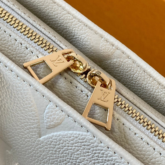 LV 25S ONTHEGO EAST WEST BAG 25 IN CREAM CALFSKIN MONOGRAM EMPREINTE