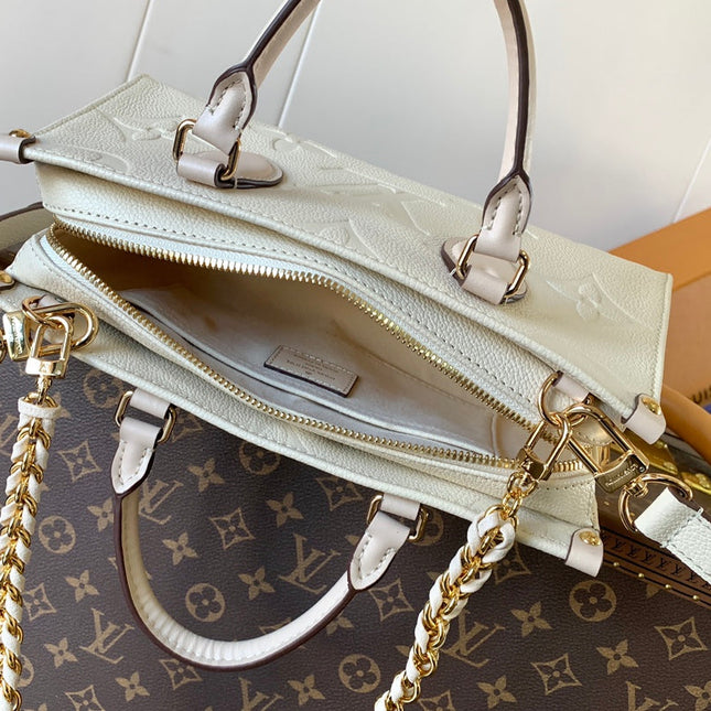 LV 25S ONTHEGO EAST WEST BAG 25 IN CREAM CALFSKIN MONOGRAM EMPREINTE