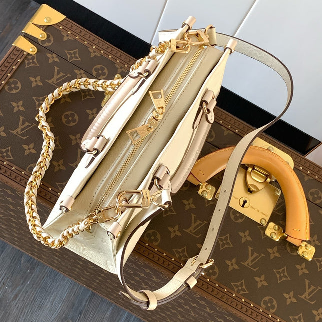 LV 25S ONTHEGO EAST WEST BAG 25 IN CREAM CALFSKIN MONOGRAM EMPREINTE