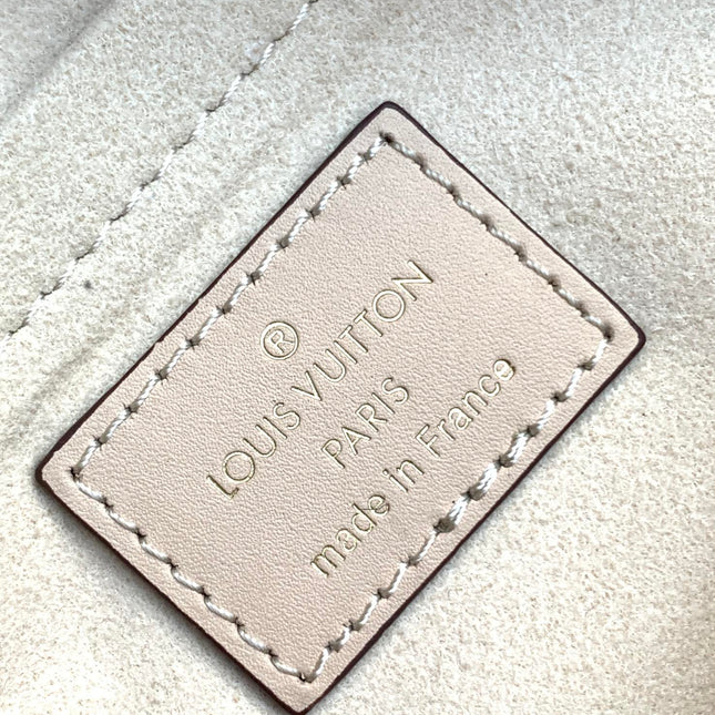 LV 25S ONTHEGO EAST WEST BAG 25 IN CREAM CALFSKIN MONOGRAM EMPREINTE