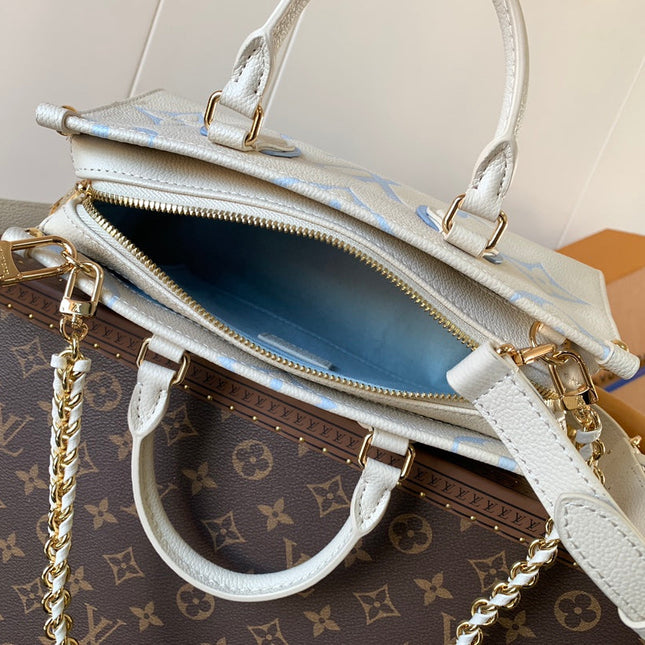 LV 25S ONTHEGO EAST WEST BAG 25 IN WHITE BLUE CALFSKIN MONOGRAM EMPREINTE