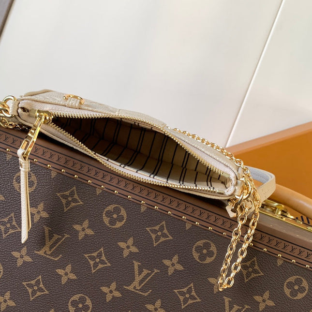 EASY POUCH ON STRAP 19 IN BEIGE MONOGRAM EMPREINTE LEATHER