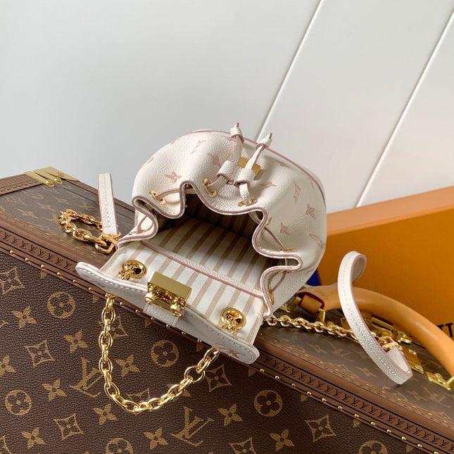 NANO NOÉ 19 IN WHITE MIX PINK MONOGRAM EMPREINTE CALFSKIN