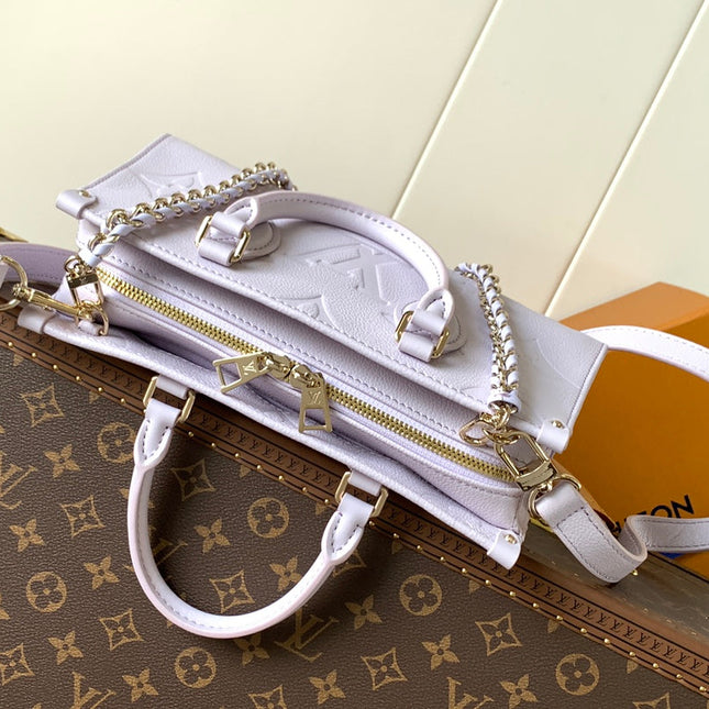 LV 25S ONTHEGO EAST WEST BAG 25 IN LIGHT LAVENDER CALFSKIN MONOGRAM EMPREINTE