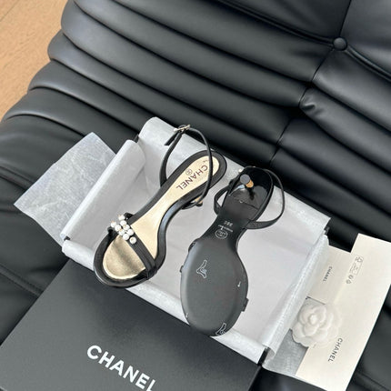 PEARL SANDAL IN BLACK AND GOLD LAMBSKIN 75 MM