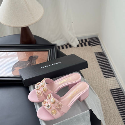 MULE SLIDE SANDALS IN PINK LAMBSKIN WITH LOGO STICKER DETAIL