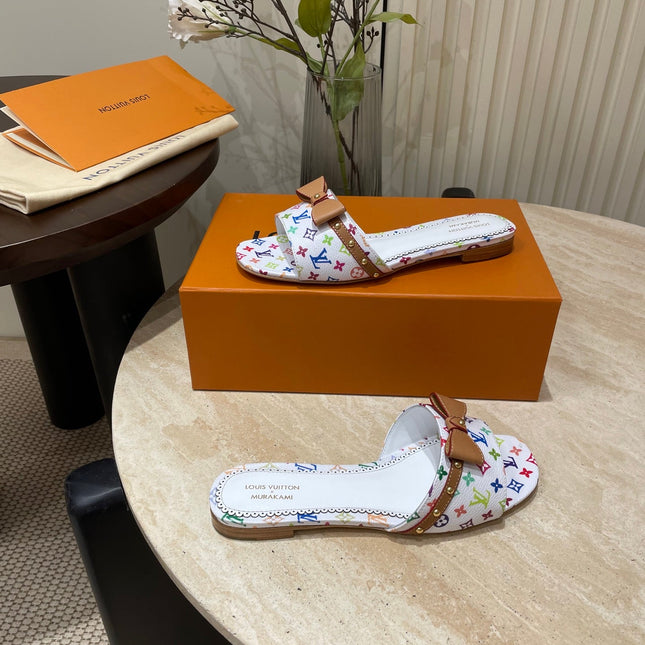 FLAT MULES IN WHITE MONOGRAM LAMBSKIN